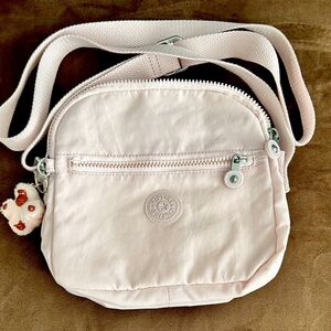 Kipling pink plush crossbody bag